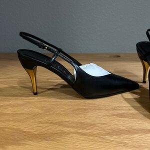 Gucci black and gold pumps 7.5 brand new